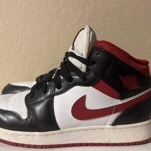 Nike Air Jordan Black, Red, and White Sneakers